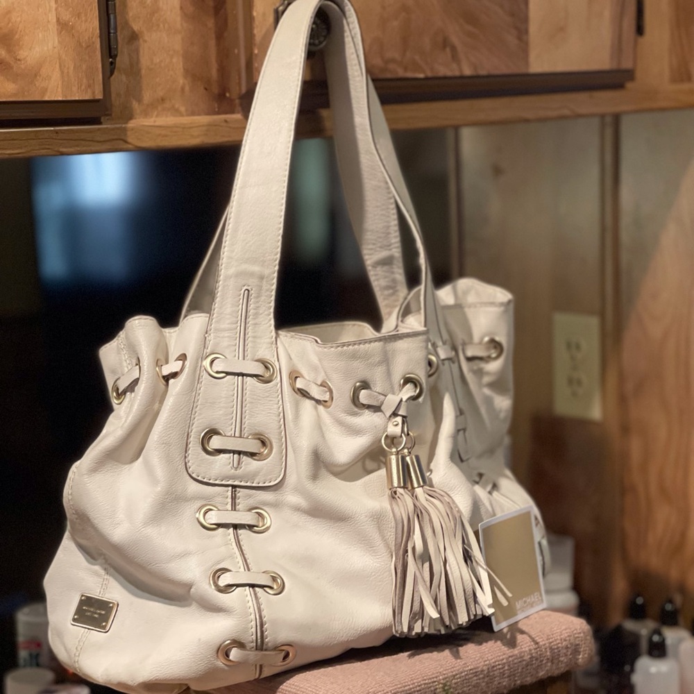 Michael Kors Astor White Grommeted tasseled Shoulder Handbag